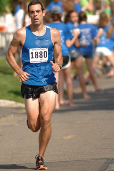 How does temperature affect running performance?